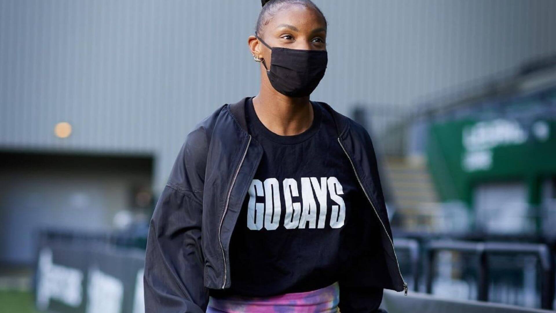 crystal dunn wearing go gays shirt