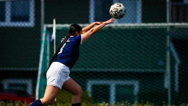 Girl taking a throw-in