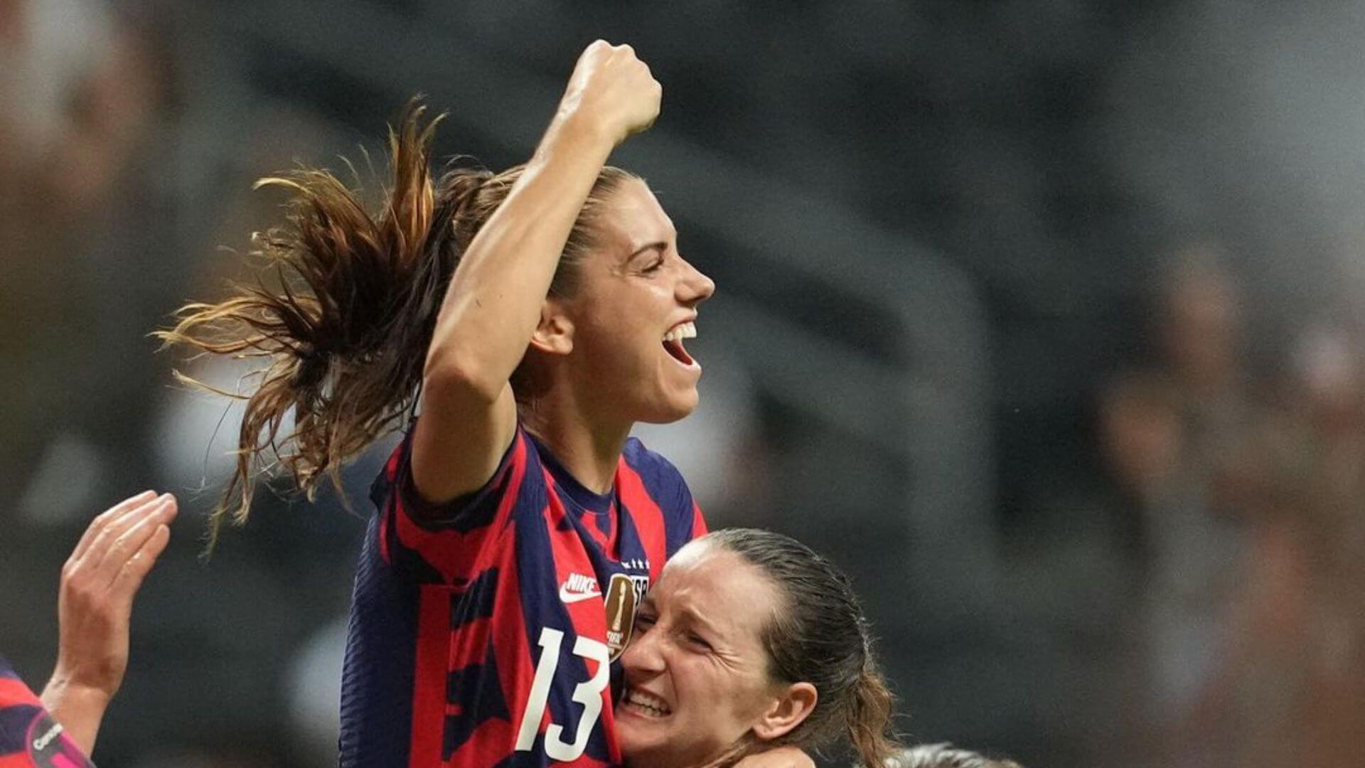 Alex Morgan celebrates after her goal