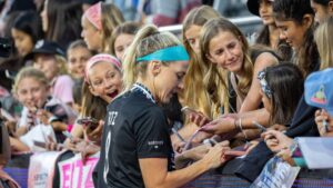 Julie Ertz talking with fans