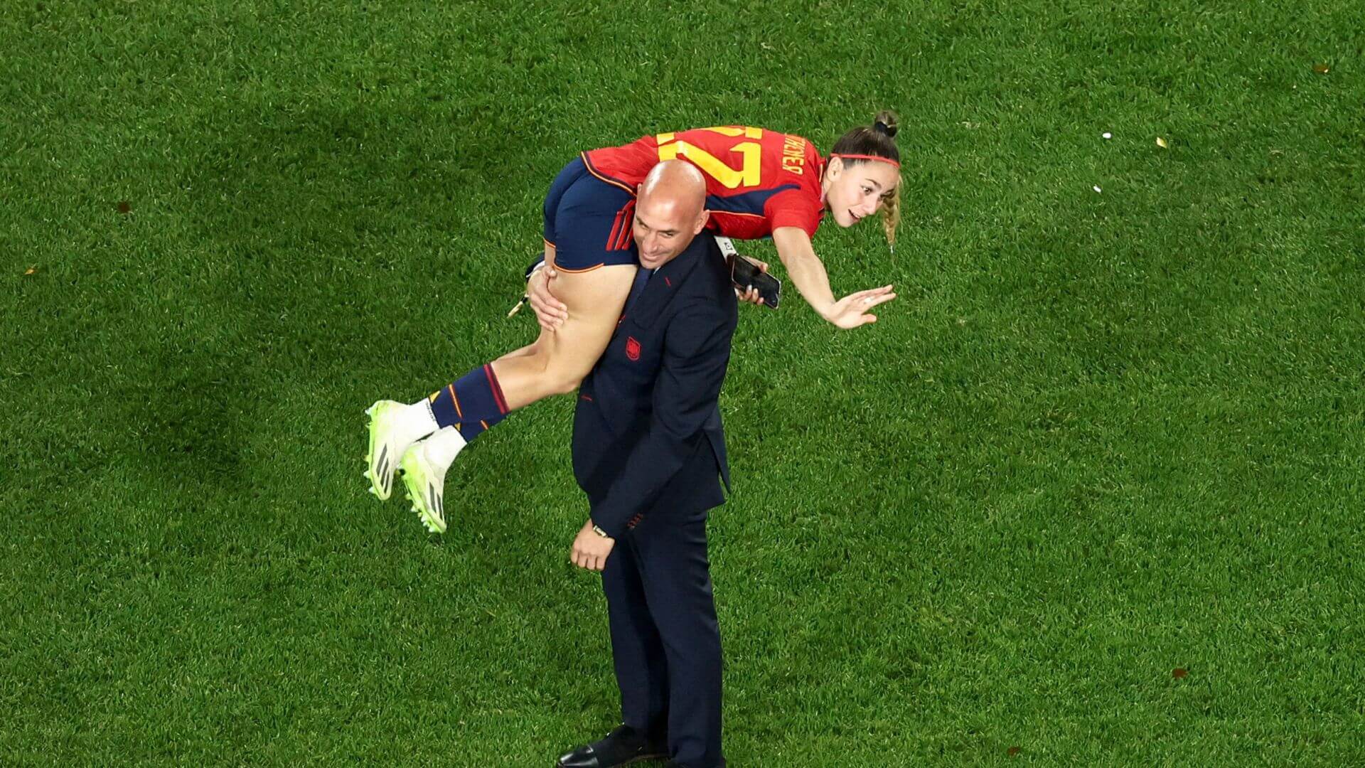 Luis Rubiales, carrying a Spanish forward after the World Cup final